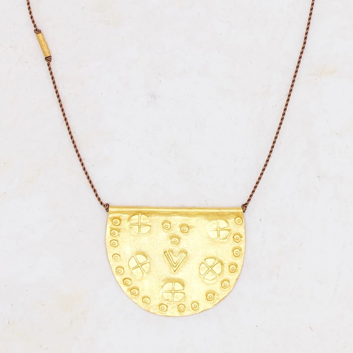 Gold talisman store necklace